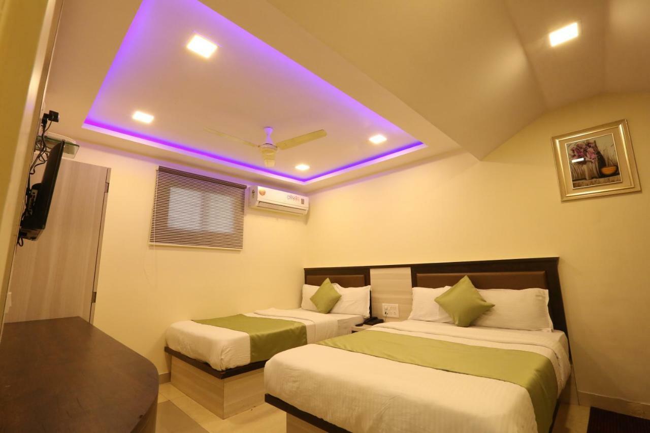 Hotel Happyland Mumbai Bagian luar foto