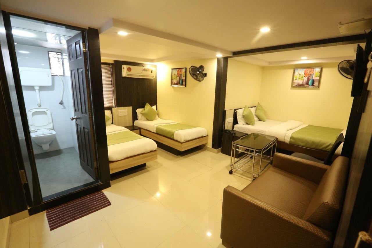 Hotel Happyland Mumbai Bagian luar foto