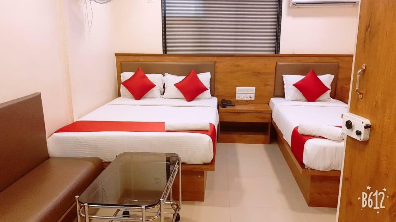 Hotel Happyland Mumbai Bagian luar foto