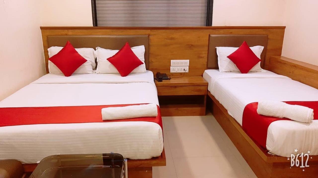 Hotel Happyland Mumbai Bagian luar foto