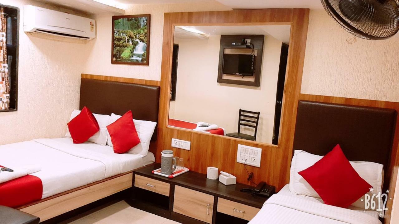 Hotel Happyland Mumbai Bagian luar foto