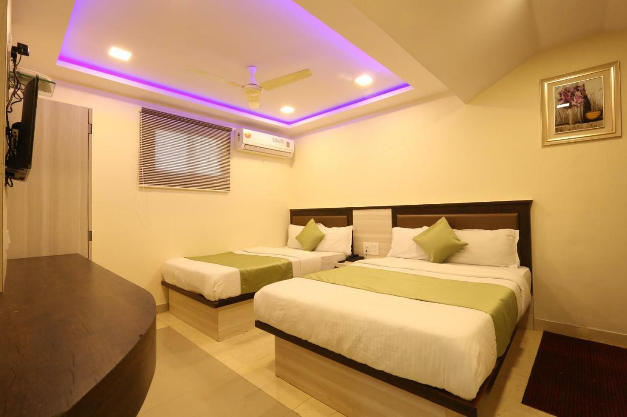 Hotel Happyland Mumbai Bagian luar foto