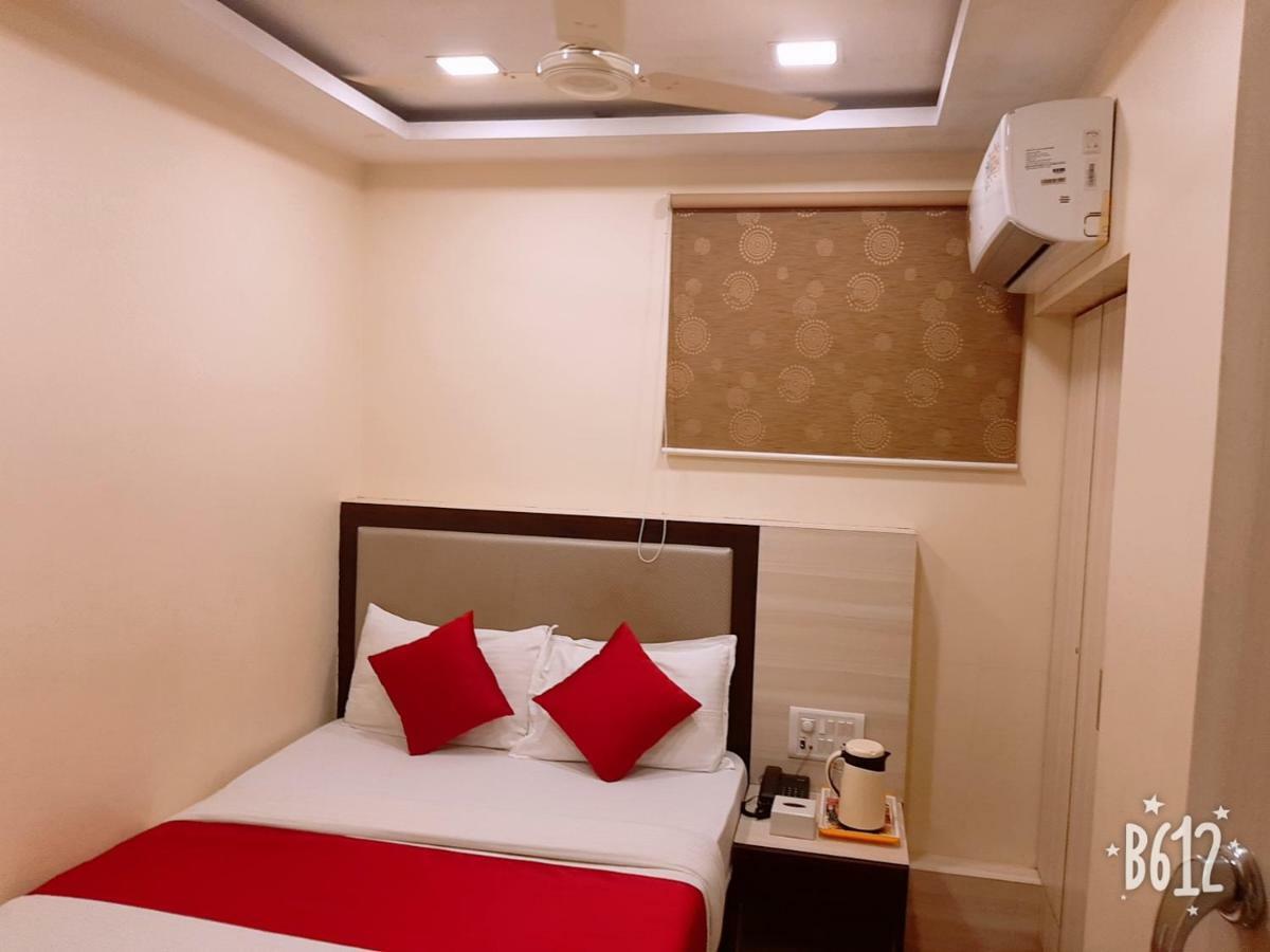 Hotel Happyland Mumbai Bagian luar foto