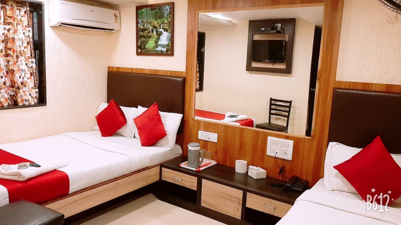 Hotel Happyland Mumbai Bagian luar foto