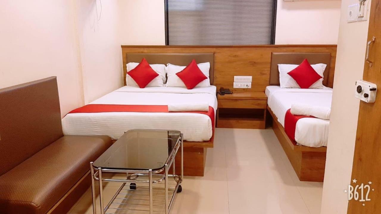 Hotel Happyland Mumbai Bagian luar foto