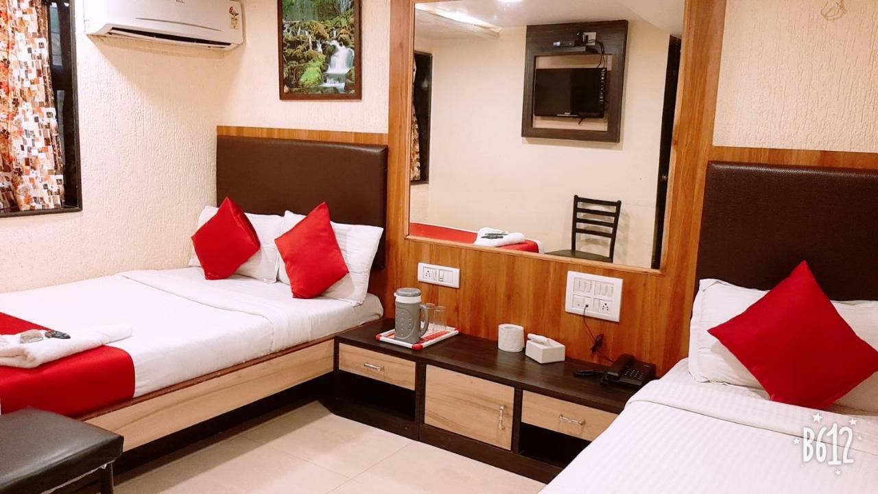 Hotel Happyland Mumbai Bagian luar foto