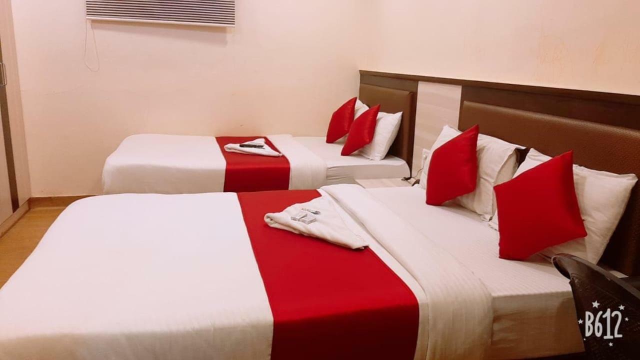 Hotel Happyland Mumbai Bagian luar foto