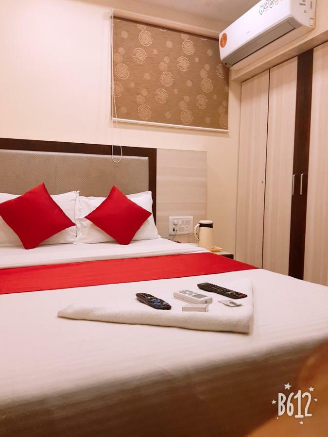 Hotel Happyland Mumbai Bagian luar foto