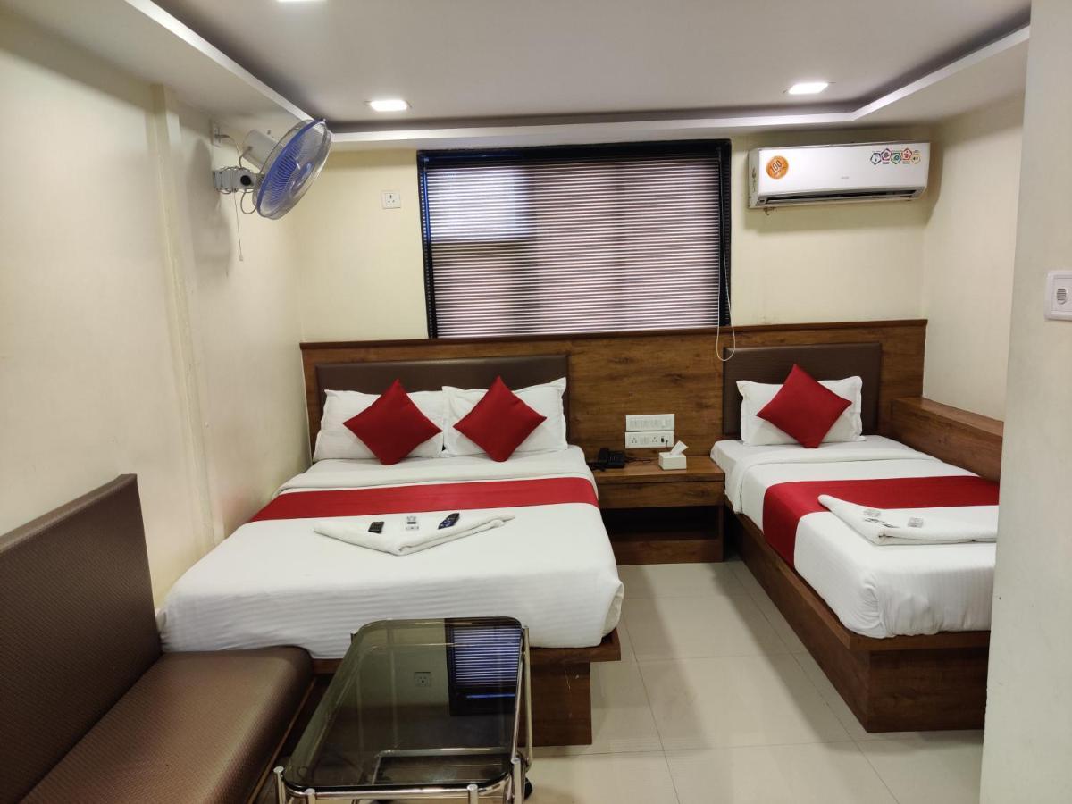 Hotel Happyland Mumbai Bagian luar foto