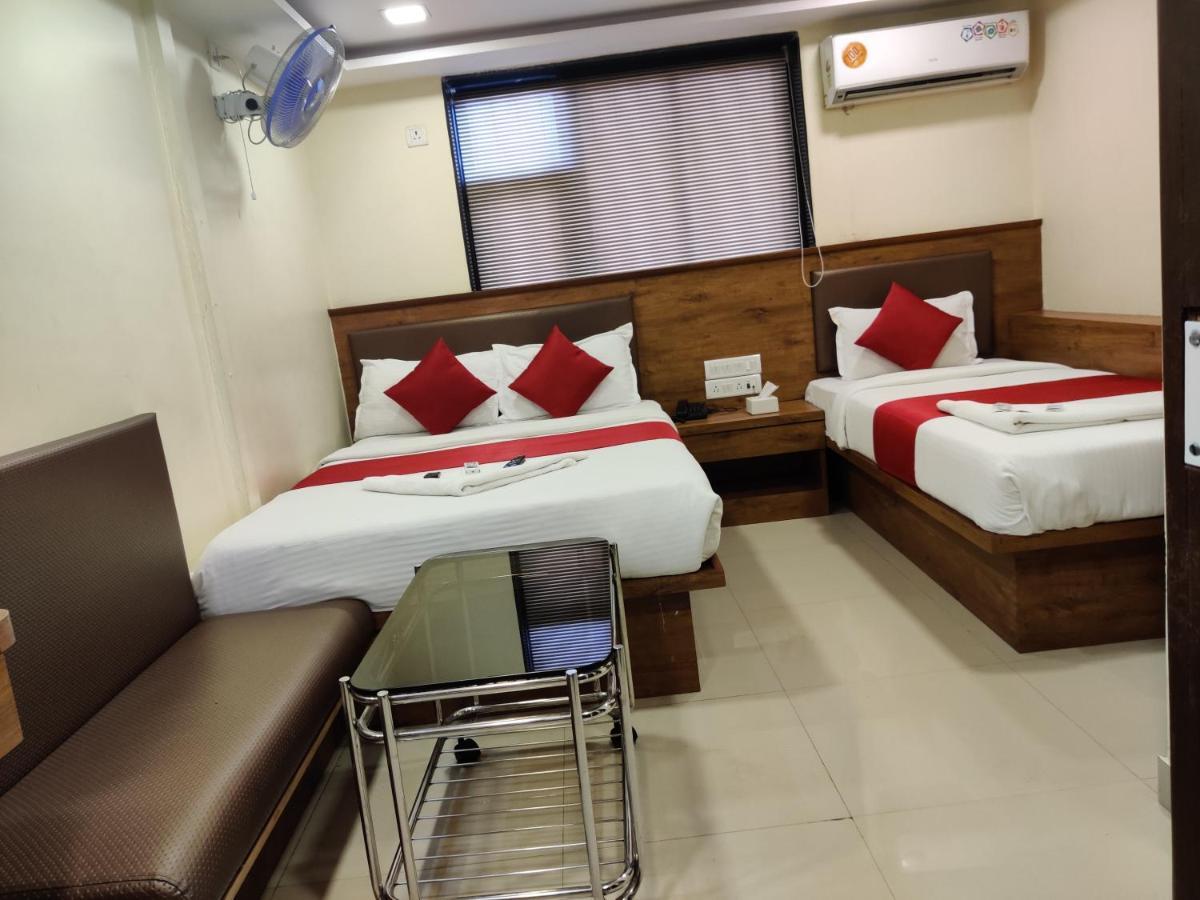 Hotel Happyland Mumbai Bagian luar foto