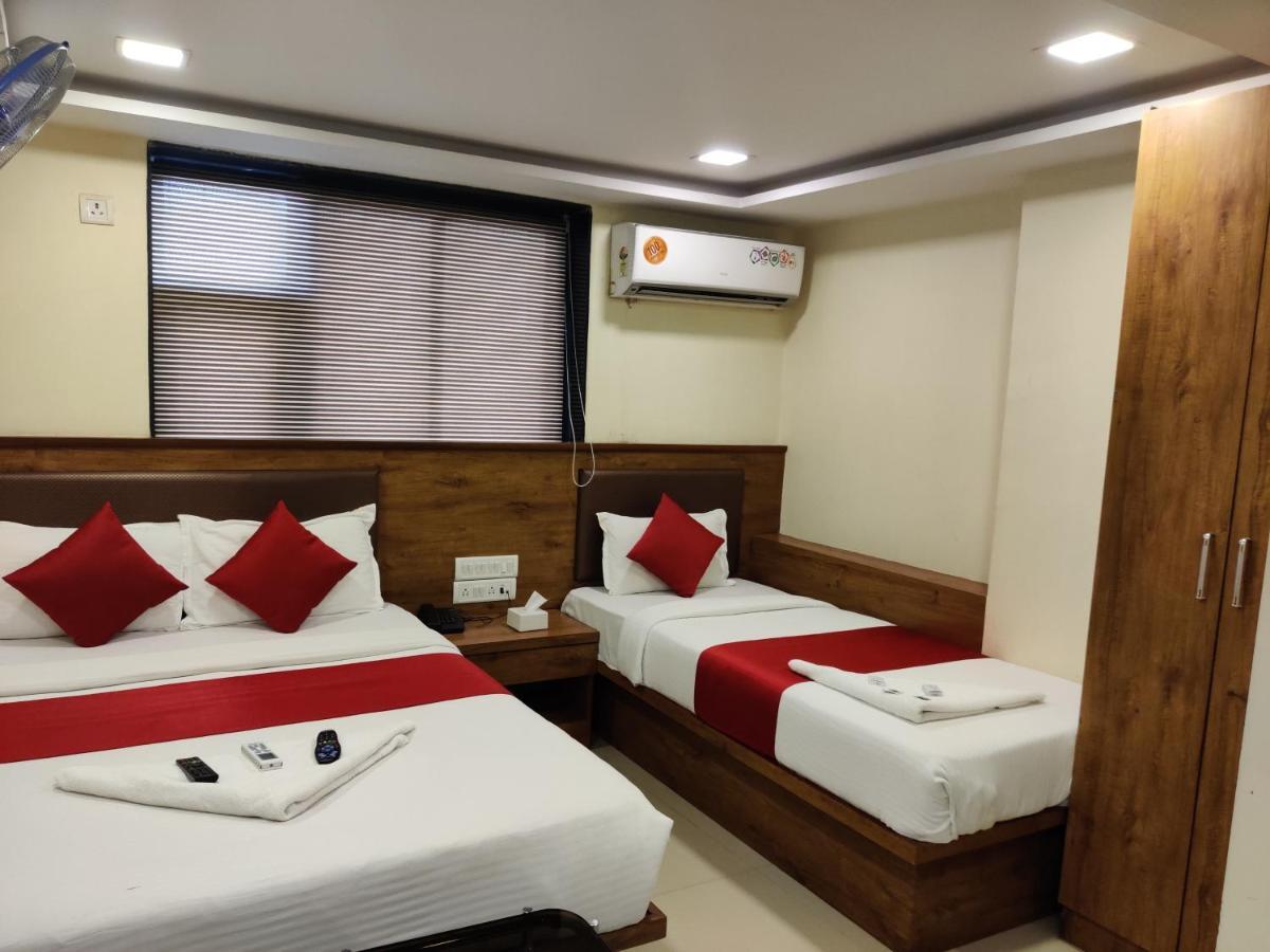 Hotel Happyland Mumbai Bagian luar foto