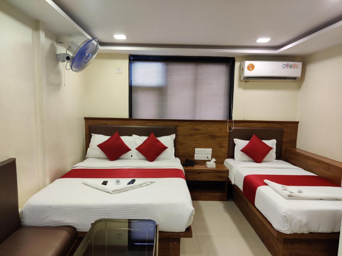 Hotel Happyland Mumbai Bagian luar foto