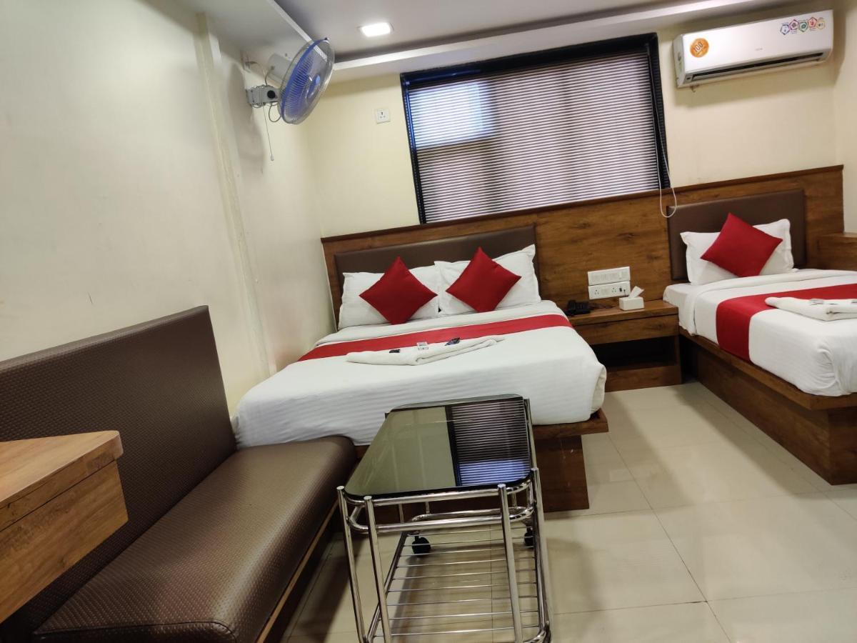 Hotel Happyland Mumbai Bagian luar foto