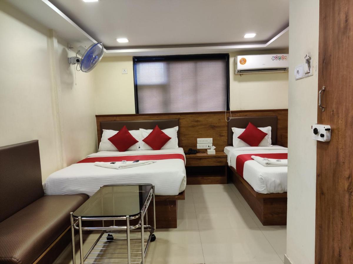Hotel Happyland Mumbai Bagian luar foto
